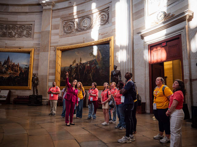 P1344353.jpg Rep. McBride gives a tour of the Capitol to the students from the Mikva Challenge.