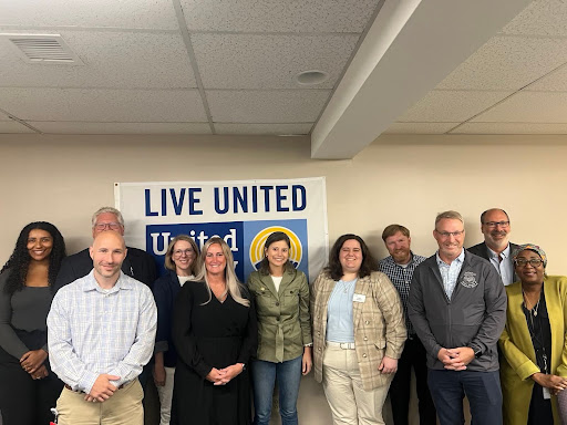 09.02.25_Image_of_Maggie_Standing_with_Staff_at_United_Way.jpg Image